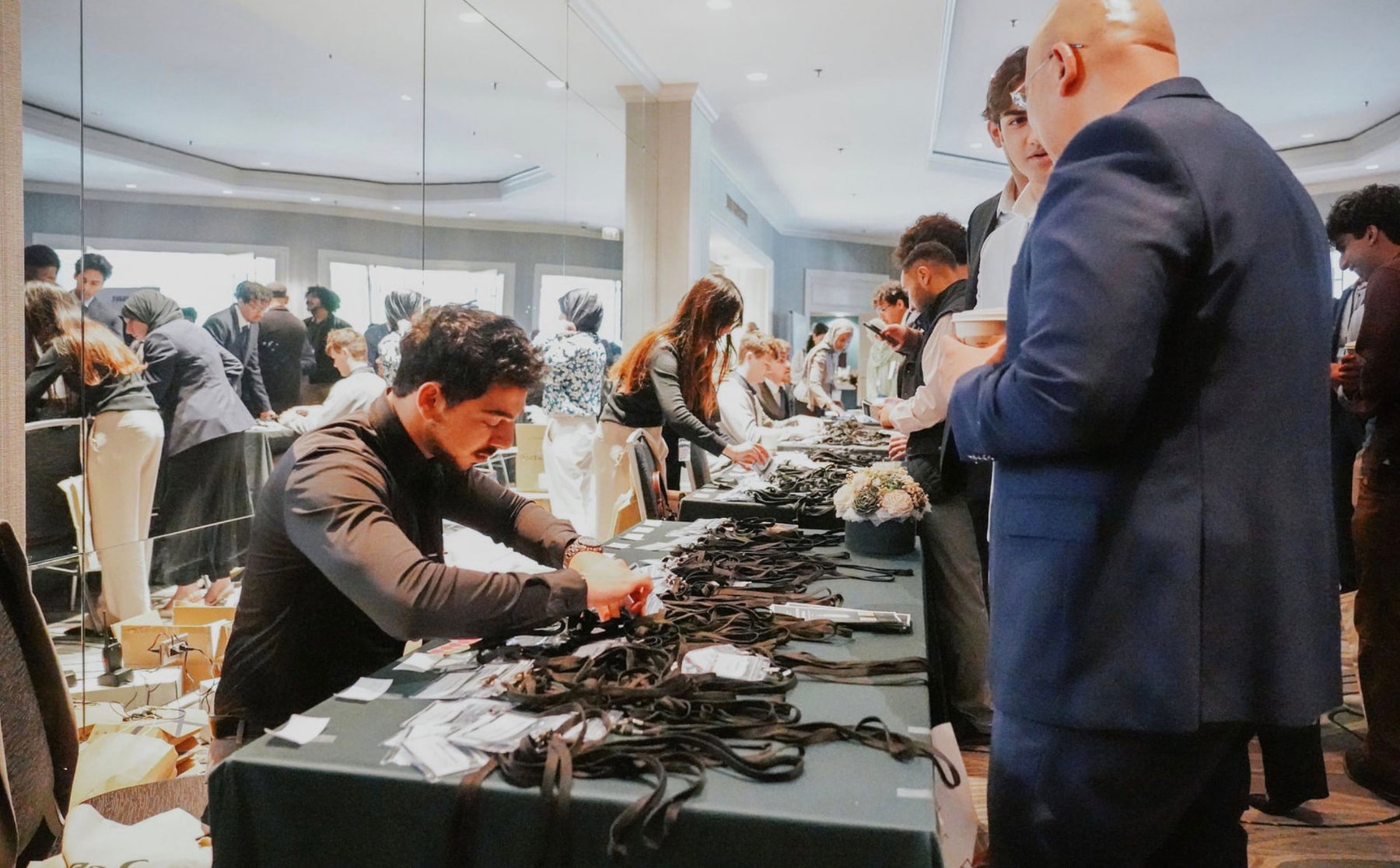 Attendees checking in and connecting at The Muslim Business Conference